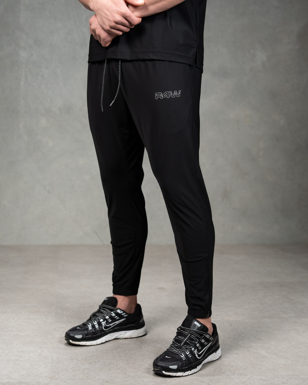 R4W PRO FLEX TRACKPANTS OUTLINE BLACK